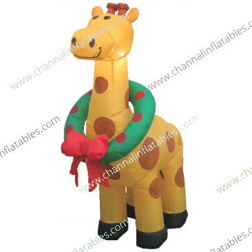 inflatable giraffe with wreath