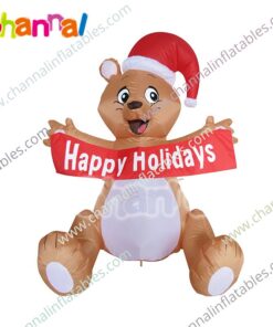 inflatable bear with holiday banner