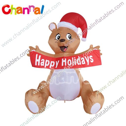 inflatable bear with holiday banner