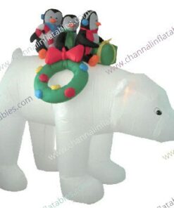 inflatable polar bear carrying penguins