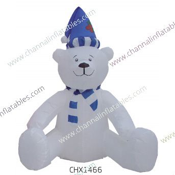 inflatable polar bear with blue hat