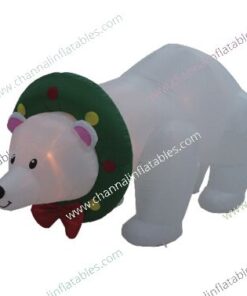 inflatable polar bear wearing wreath