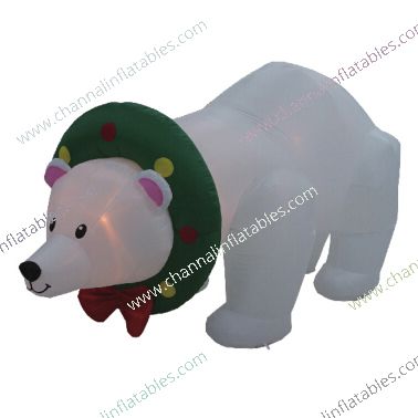 inflatable polar bear wearing wreath