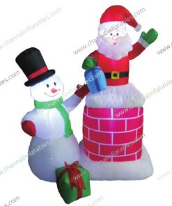 inflatable Santa in chimney with snowman