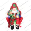 inflatable Santa sitting with penguin and elf
