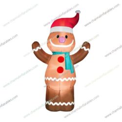 inflatable gingerbread man with Santa hat