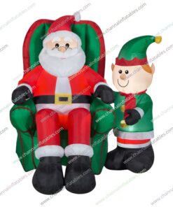 inflatable Santa in chair with elf