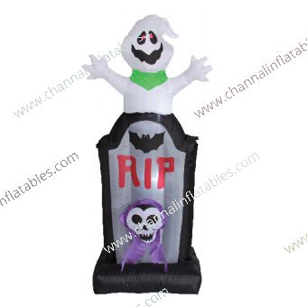 inflatable ghost on RIP headstone