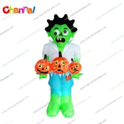 inflatable green monster with pumpkins