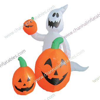 inflatable ghost holding pumpkin