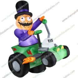 inflatable pumpkin man riding race car