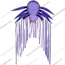 purple inflatable spider with hanging silks