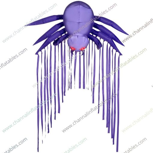 purple inflatable spider with hanging silks