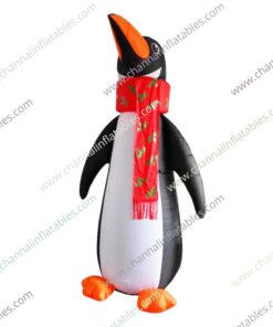 inflatable penguin with red scarf