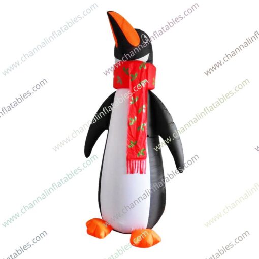 inflatable penguin with red scarf