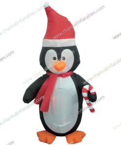 inflatable penguin holding candy cane
