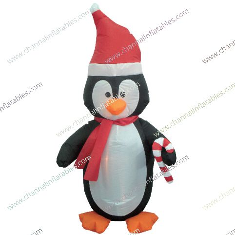 inflatable penguin holding candy cane