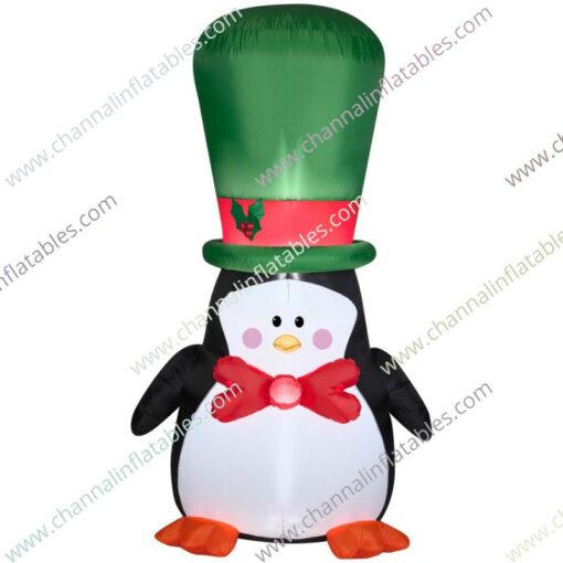 inflatable penguin with green top hat