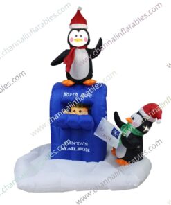 inflatable penguin with Santa's mailbox
