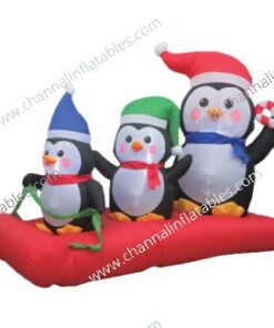inflatable trio penguins on sled