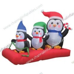 inflatable trio penguins on sled