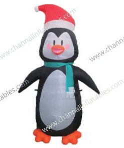 inflatable penguin with green scarf