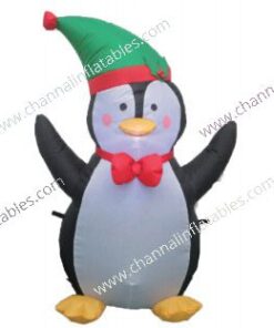 inflatable penguin with green santa hat