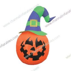 inflatable pumpkin with green witch hat