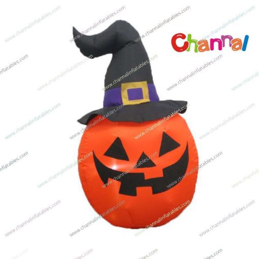 inflatable pumpkin with black witch hat