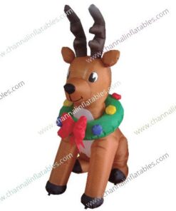 inflatable sitting reindeer with wreath