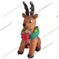 inflatable sitting reindeer with wreath