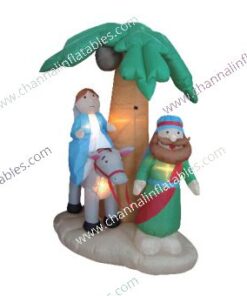 inflatable holy family under palm tree