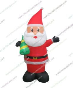 inflatable Santa holding little Christmas tree