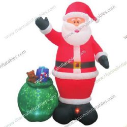 inflatable Santa with green gift bag