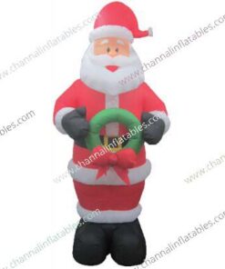 inflatable Santa holding wreath