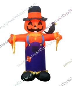 inflatable pumpkin scarecrow with bird