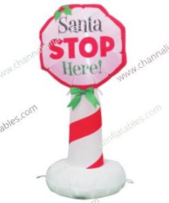inflatable Santa stop here sign