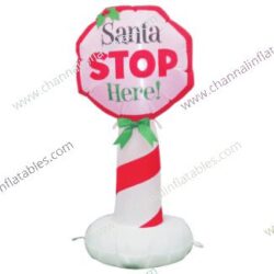 inflatable Santa stop here sign