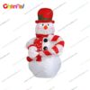 inflatable snowman with candy cane