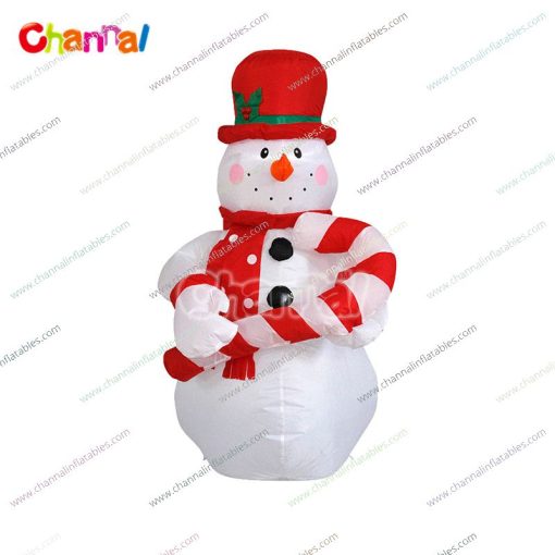 inflatable snowman with candy cane