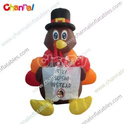 inflatable thanksgiving turkey with sign