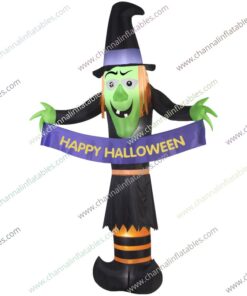inflatable witch with happy Halloween banner
